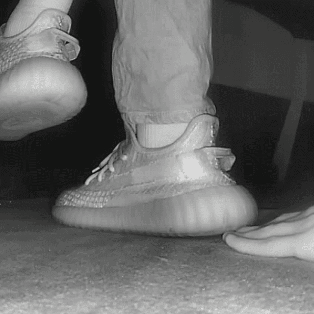 Woman in adidas yeezy sneaker unaware hand trample in cinema 1