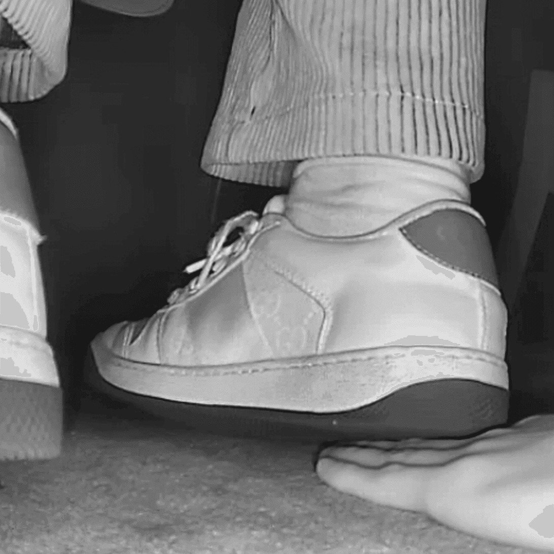 Two women in cinema unaware hand trample with Adidas + Gucci sneakers thumb 2