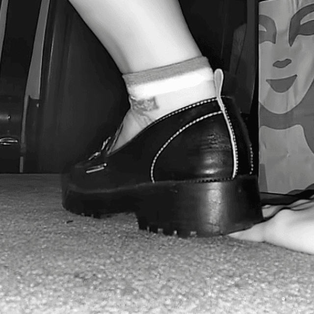 Woman in cinema unaware hand trample with leather shoes 1