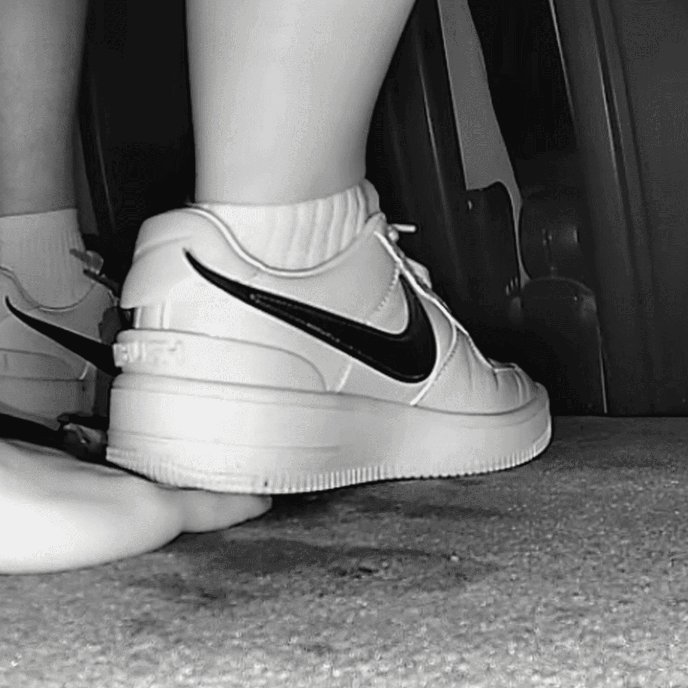 Woman in cinema unaware hand trample with Nike Air Force 1 sneakers thumb 2