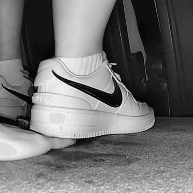 Woman in cinema unaware hand trample with Nike Air Force 1 sneakers 2