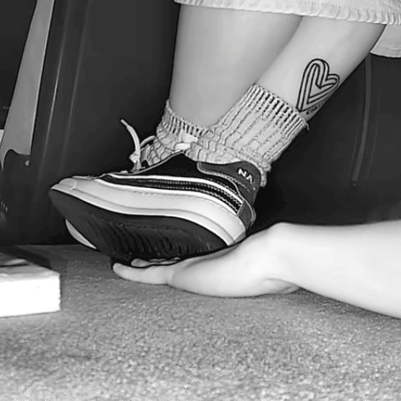 Woman in canvas shoes unaware hand trample in cinema thumb 3