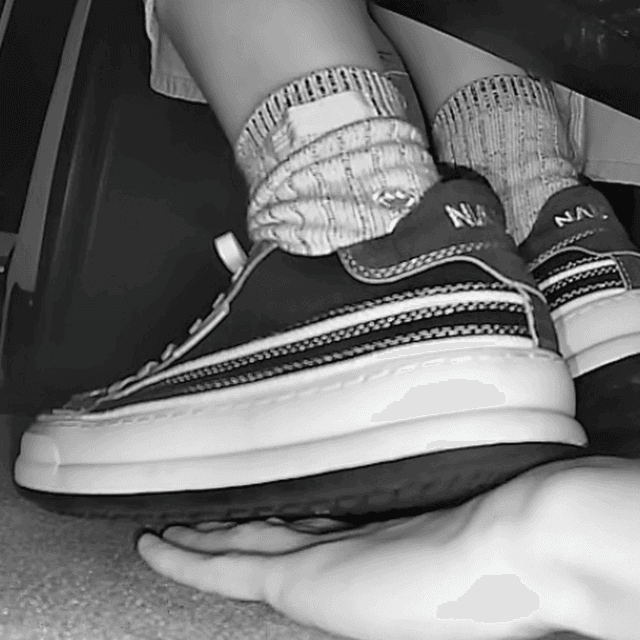 Woman in canvas shoes unaware hand trample in cinema 1