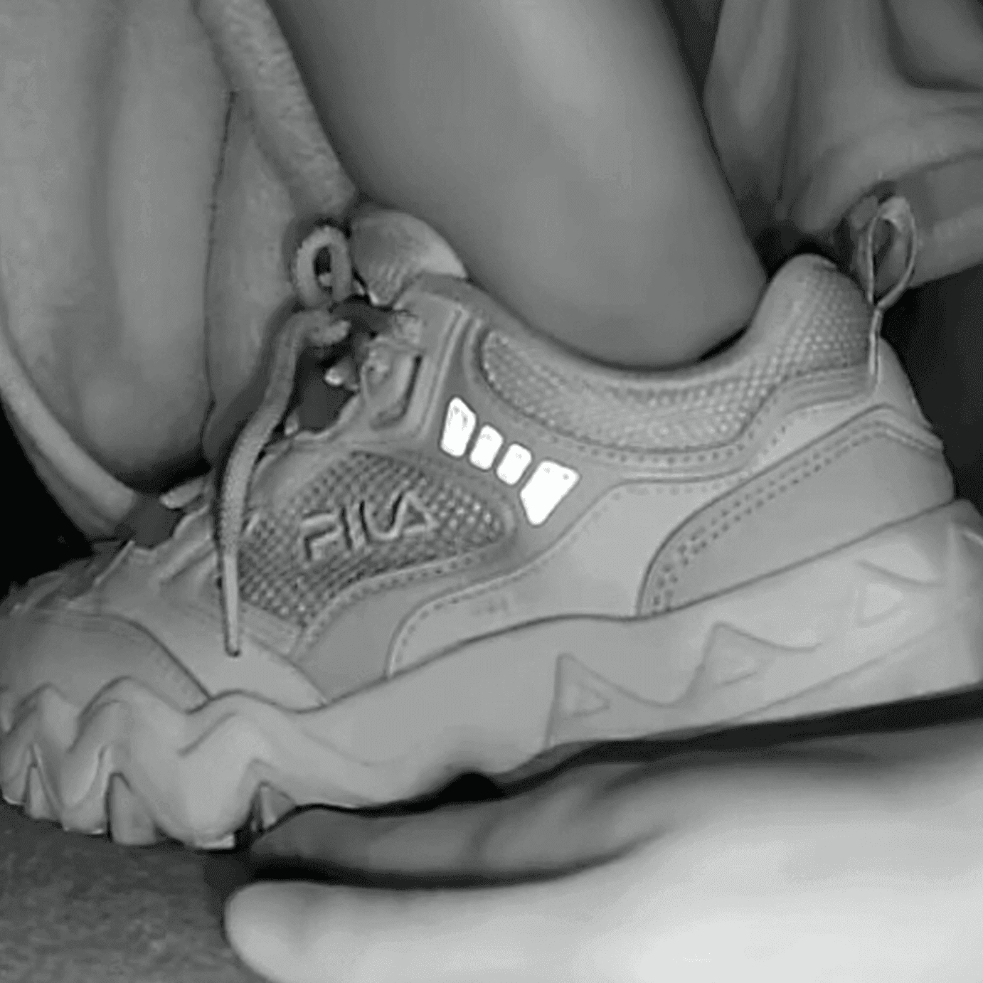 Woman adidas superstar + fila sneaker unaware hand trample in cinema thumb 2