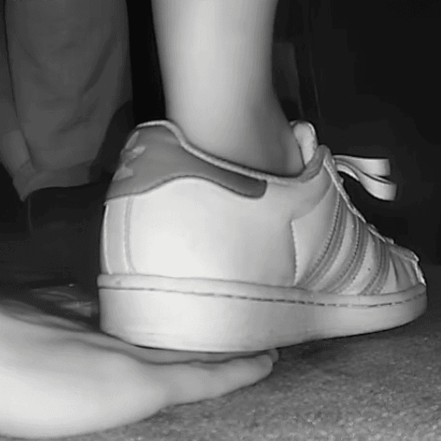 Woman adidas superstar + fila sneaker unaware hand trample in cinema 1
