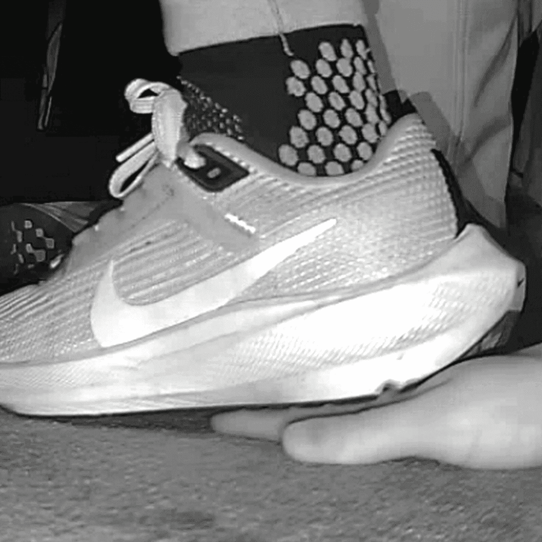 Young woman unaware hand trample with Nike running shoes in cinema thumb 5
