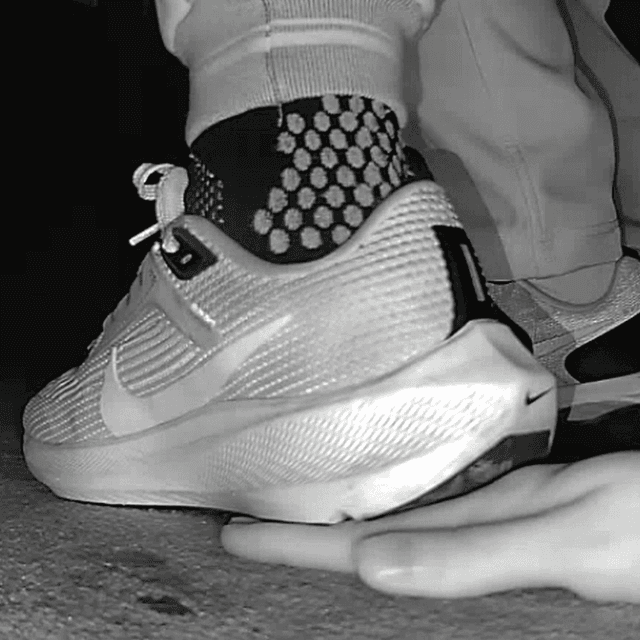 Young woman unaware hand trample with Nike running shoes in cinema 4