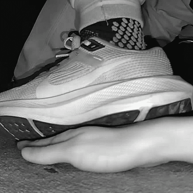 Young woman unaware hand trample with Nike running shoes in cinema 3