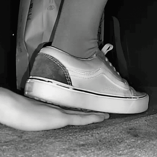 Woman black Converse shoe + Vans unaware hand trample in cinema 1